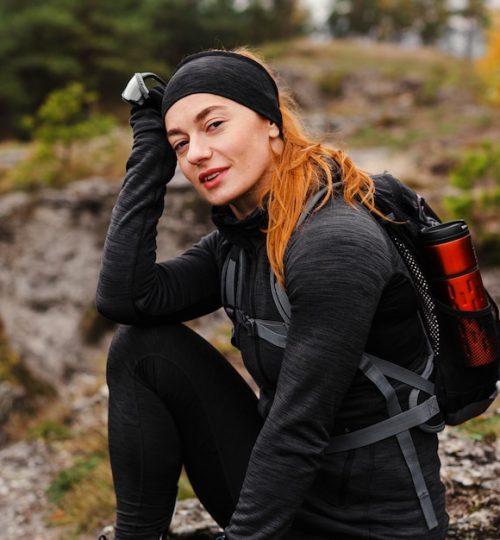 female-sporty-jogger-taking-break-medium-shot_23-2148762213