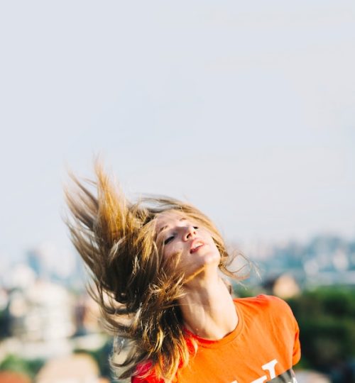 young-girl-posing-rooftop_23-2147824337